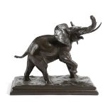 A BRONZE ANIMALIER MODEL OF AN ELEPHANT EARLY 20TH CENTURY walking with his trunk raised, on a