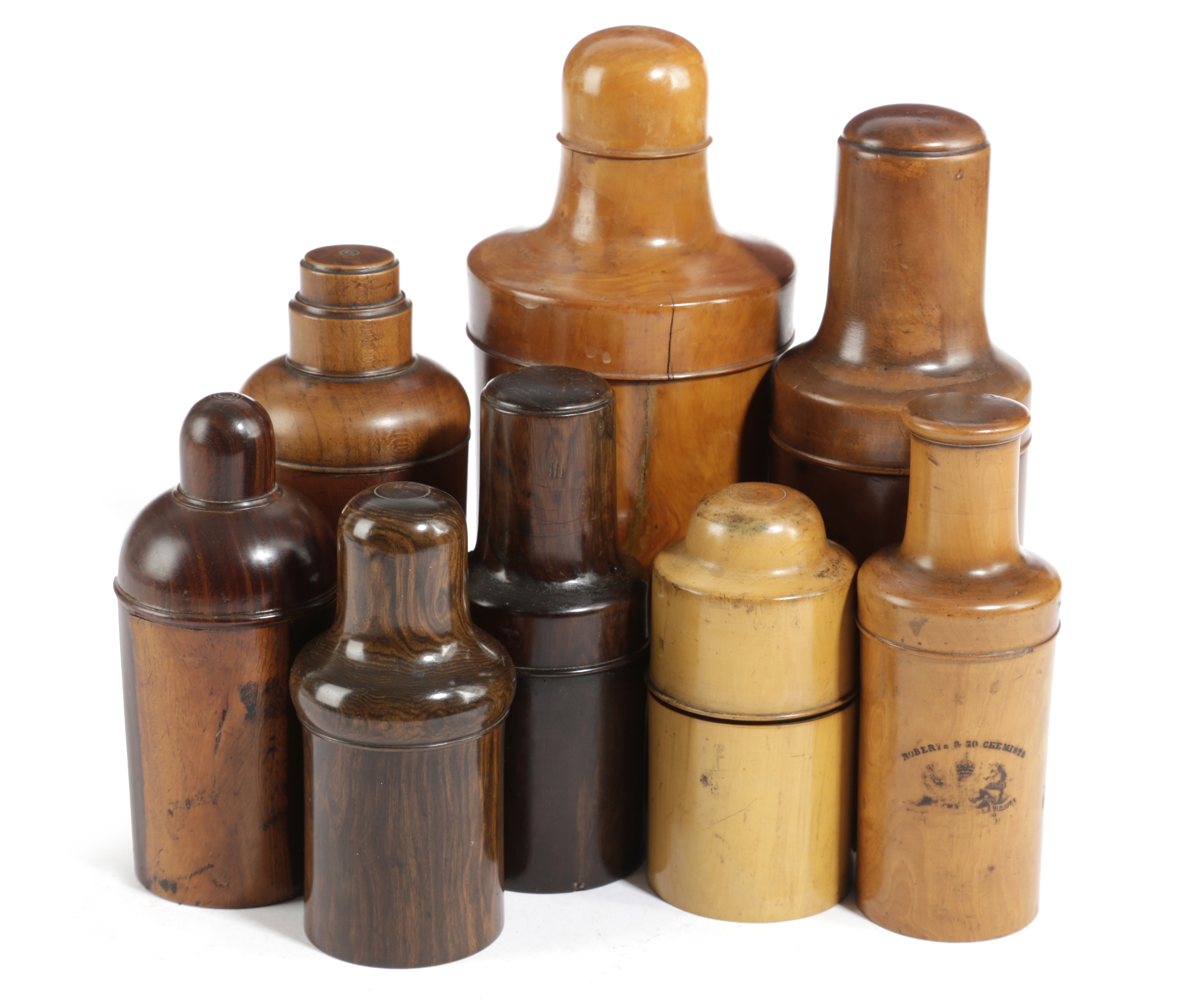 EIGHT TREEN MEDICINE BOTTLE CASES 19TH / EARLY 20TH CENTURY in various woods inlcuding: lignum