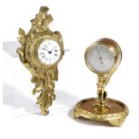 A FRENCH GILT BRASS CARTEL CLOCK IN LOUIS XV STYLE, 19TH CENTURY the brass pocket watch style