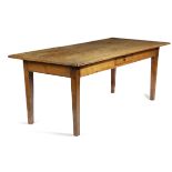 A FRENCH CHERRY AND FRUITWOOD FARMHOUSE KITCHEN TABLE 19TH CENTURY the rectangular top above a