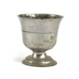 A PEWTER GOBLET 17TH / 18TH CENTURY the bell shaped bowl with a slightly flared rim, above a short