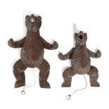 TWO BLACK FOREST LINDEN WOOD ARTICULATED 'JUMPING JACK' BEARS C.1900 each with glass eyes and an