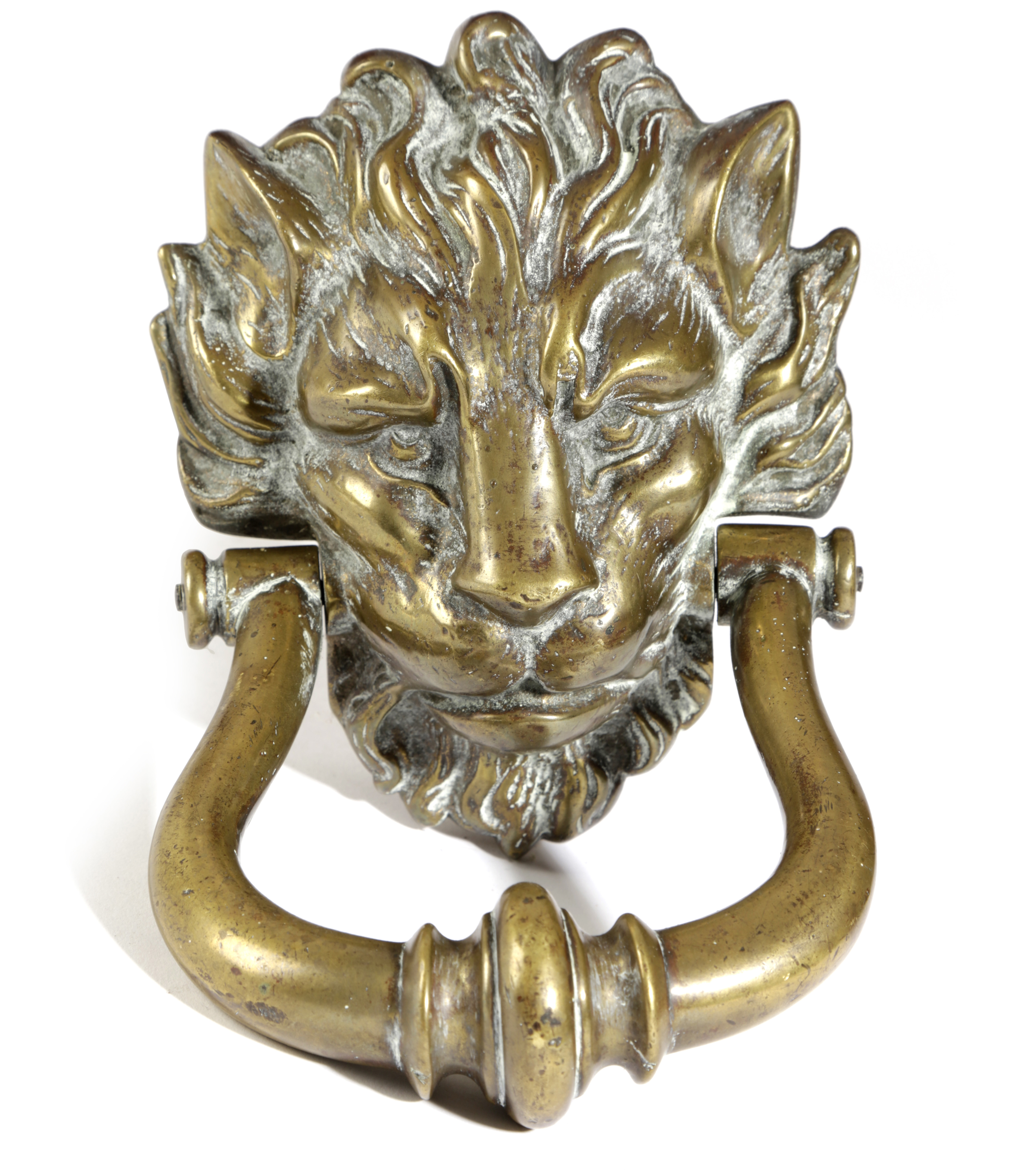 A BRASS DOOR KNOCKER MID-19TH CENTURY in the form of a lion's mask 24.5cm high, 14cm wide