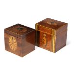 A GEORGE III MAHOGANY TEA CADDY C.1800 of rectangular form, inlaid with fan and shell paterae, the