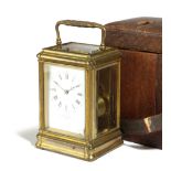 A FRENCH GILT BRASS CARRIAGE CLOCK RETAILED BY J.W.BENSON, LATE 19TH CENTURY the brass eight day