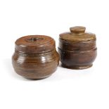 TWO TREEN SYCAMORE SPICE POTS AND COVERS PROBABLY 18TH CENTURY each decorated with reeded bands, one