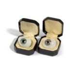 TWO OPTICIAN'S PROSTHETIC GLASS EYES LATE 19TH / EARLY 20TH CENTURY with blue irises, one showing