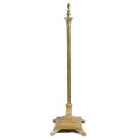 A BRASS CORINTHIAN COLUMN STANDARD LAMP LATE 19TH / EARLY 20TH CENTURY with an adjustable stem 130cm