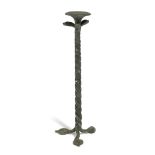 A ROMAN BRONZE OIL LAMP STAND the circular top above a column made from three entwined serpents,