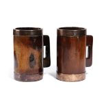A PAIR OF GEORGE III TREEN LIGNUM VITAE AND COPPER BOUND MEASURES OR TANKARDS C.1800 of