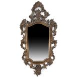 A FRENCH CARVED WOOD WALL MIRROR LATE 19TH CENTURY the tapering plate inside a Rococo style,