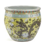 A CHINESE PORCELAIN YELLOW GROUND JARDINIERE OR FISH BOWL 19TH CENTURY painted with two dragons