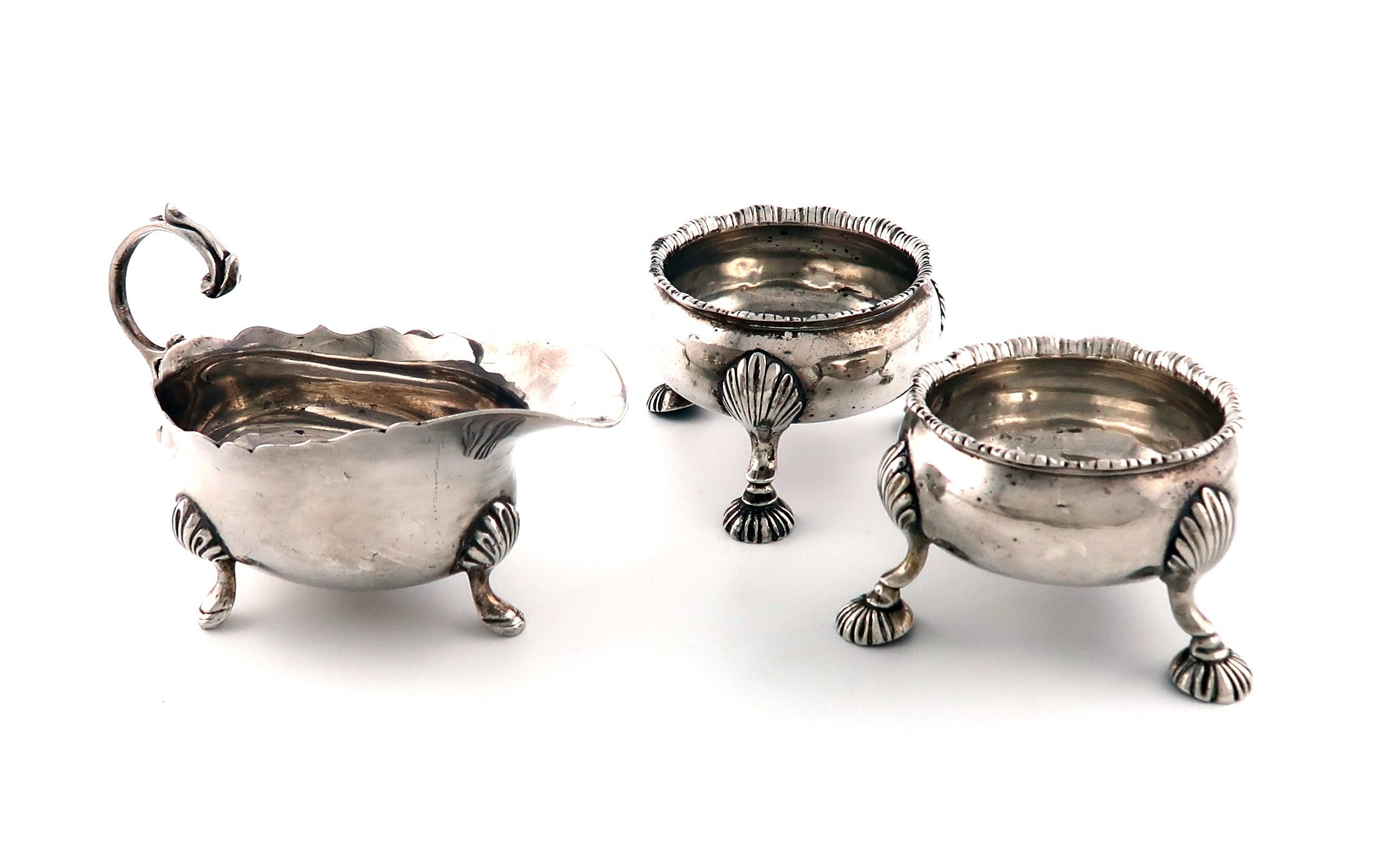 A pair of George II silver salt cellars, by David Hennell, London 1758, circular form, gadroon