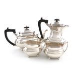 A matched four-piece silver tea set, by Harrison Brothers & Howson, Sheffield 1930, 1933, 1935,