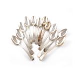 A collection of twelve George III silver Old English pattern tablespoons, various dates and