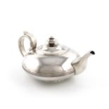 λA George III West Country silver teapot, maker's mark worn, Exeter 1826, compressed circular