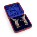 A pair of Edwardian novelty silver hare pepper pots, by Gourdel Vales & Co, Birmingham 1906,