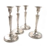 A matched set of four George III silver candlesticks, by John Parsons & Co., Sheffield 1790,