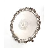 A George II silver salver, by Richard Rugg, London 1759, shaped circular form, a moulded scroll