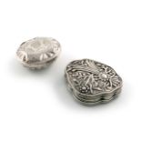 Two unmarked silver boxes, late 18th/19th century, one of cartouche form, chased foliate