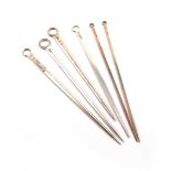 A collection of six antique silver meat skewers, various dates and makers, tapering form,