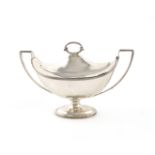 A silver two-handled sauce tureen and cover, by Nathan and Hayes, Birmingham 1937, oval form, scroll