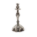 A 19th century continental silver candlestick, marked 13, possibly Austro-Hungarian, in the Rococo
