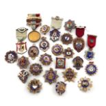 A collection of twenty-five silver, silver-gilt and enamel Masonic badges, various dates and makers,