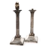 A pair of Victorian silver candlesticks, by Hawksworth, Eyre & Co, Sheffield 1857, Corinthian column