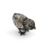 An Edwardian novelty silver chick pepper pot, by William Edward Hurcomb, London 1906, modelled in