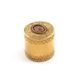 A late 18th century gold and enamel box, with a trace of a mark, probably French, cylindrical