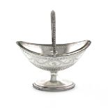 A George III silver swing-handled sugar basket, by Hester Bateman, London 1785, oval form, pierced