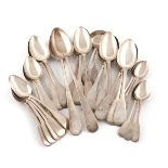 A collection of early 18th century Newcastle silver Fiddle pattern flatware, comprising: a set of