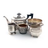A mixed lot of silver items, comprising: a teapot by Harrison Brothers, Sheffield 1919, oval form,