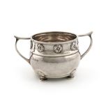By A E Jones, an Arts and Crafts silver two handled sugar bowl, Birmingham 1929, circular bellied