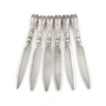 By Tiffany and Co. a set of six Wave Edge pattern fruit knives, the blades with a serrated edge, the