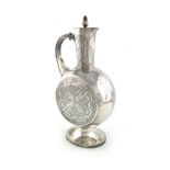 A Victorian Aesthetic Movement silver ewer, by Frederick Elkington, Birmingham 1870, circular