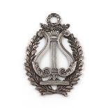 A William IV silver badge, by George Reid, London 1834, shaped oval form, foliate borders with a