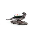 A novelty silver golden pheasant pin cushion, by Sampson Mordan & Co Ltd., Chester 1905, modelled in