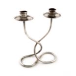 A modern continental silver double candlestick, stamped 900, twisted wire-work form and base,