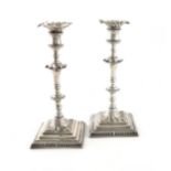 A pair of George III cast silver candlesticks, by Robert Jones, London 1778, knopped tapering