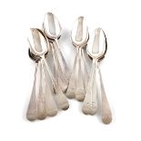 A collection of thirteen antique silver Old English pattern tablespoons, including: a set of five