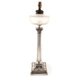 An Edwardian silver oil lamp, by Hawksworth, Eyre and Co., Sheffield 1901, Corinthian column form,