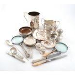 A mixed lot, comprising silver items: two pepper pots, London 1931 and 1932, two circular boxes, two