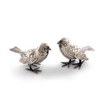 A pair of Victorian novelty silver bird pepper pots, by Jane Brownett, London 1881, modelled in a