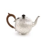 A Victorian silver teapot, by Army & Navy Cooperative Society Ltd (Frederick Bradford Macrea),