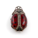 A German novelty silver and enamel ladybird vinaigrette, maker's mark M.F, circa 1900, with sprung