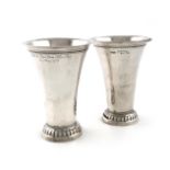 A pair of German silver beakers, by Neresheimer of Hanau, with import marks for Chester 1909,