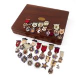 A collection of twenty-five silver, silver-gilt and enamel Masonic badges, various dates and makers,