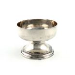A silver cup, by T. Bradbury and Son, Sheffield 1931, plain circular form, on a raised tapering